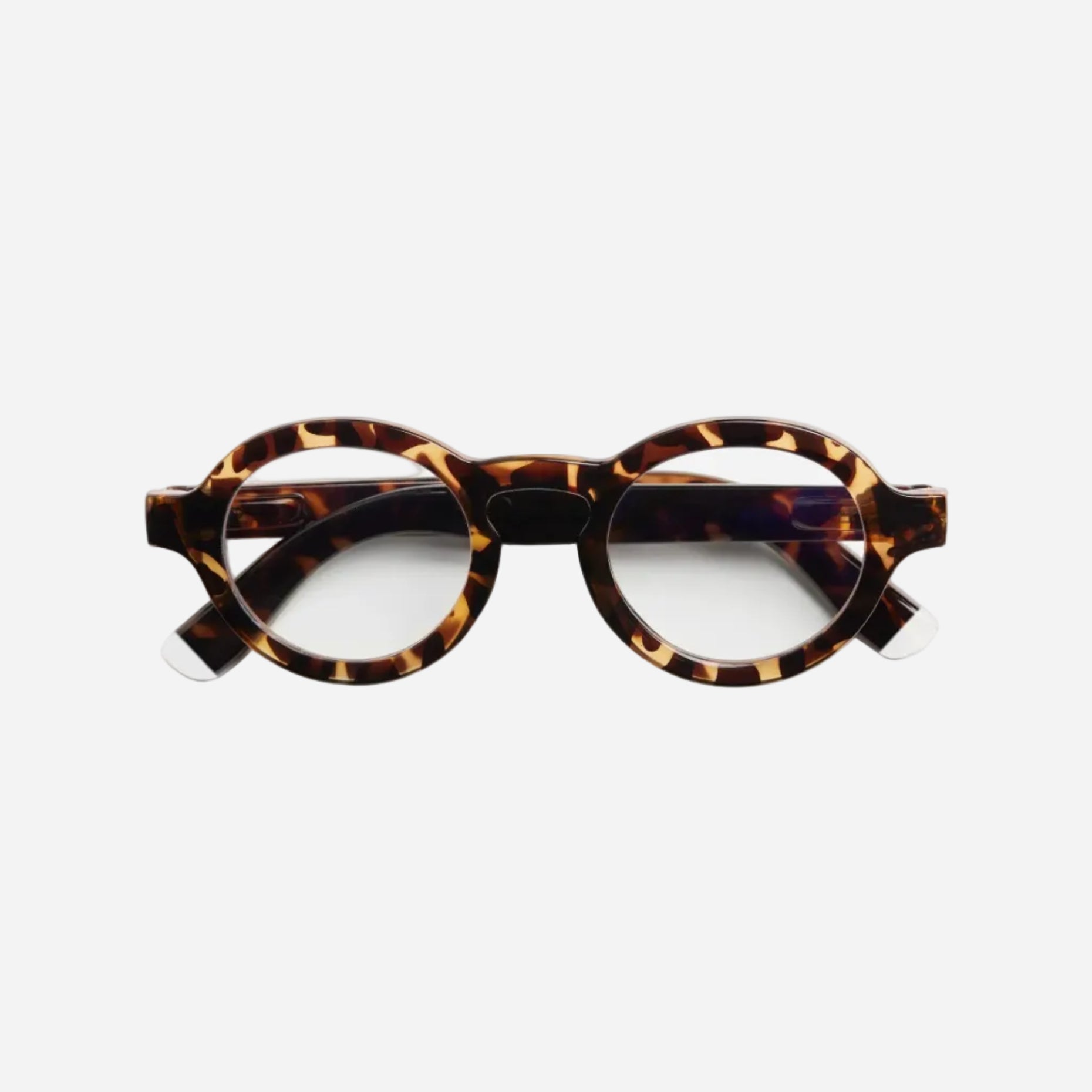 Tortoiseshell eyeglasses on a white background