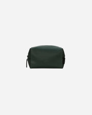 Green toiletry bag on a white background