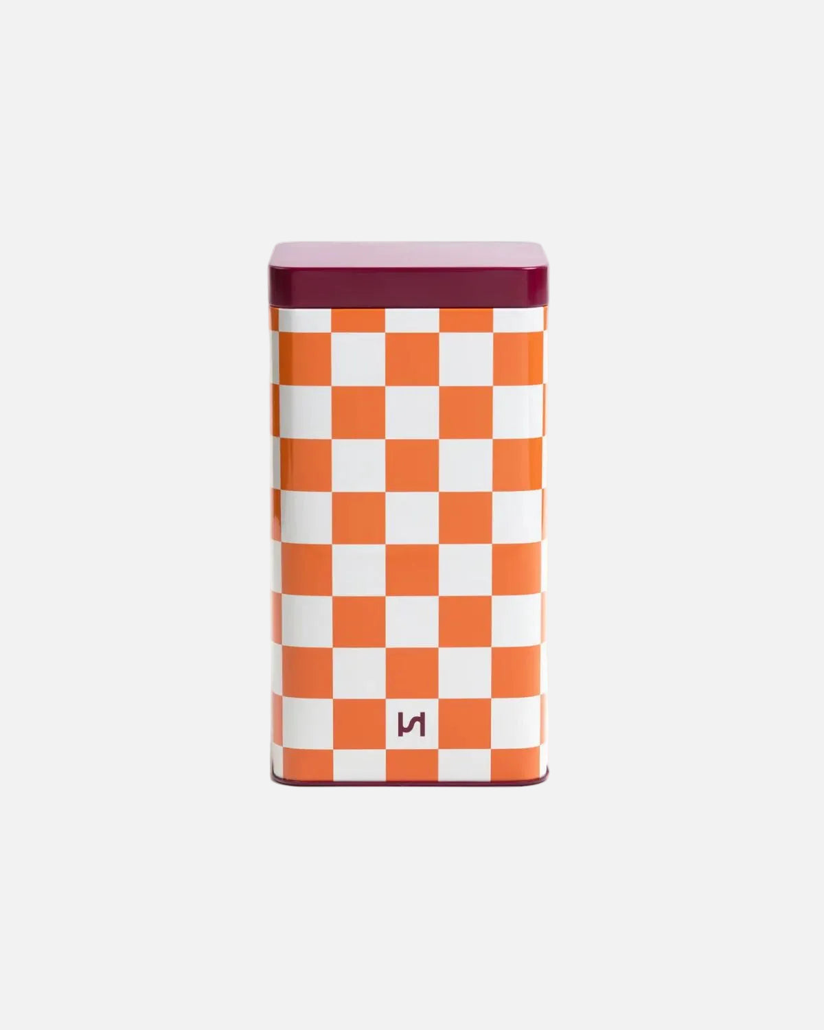A rectangular metal tin with a white and orange checkerboard pattern, a dark plum purple lid, and a small stylized 'H' logo near the bottom, set against a plain white background.