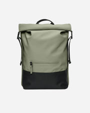 Green and black backpack on a white background