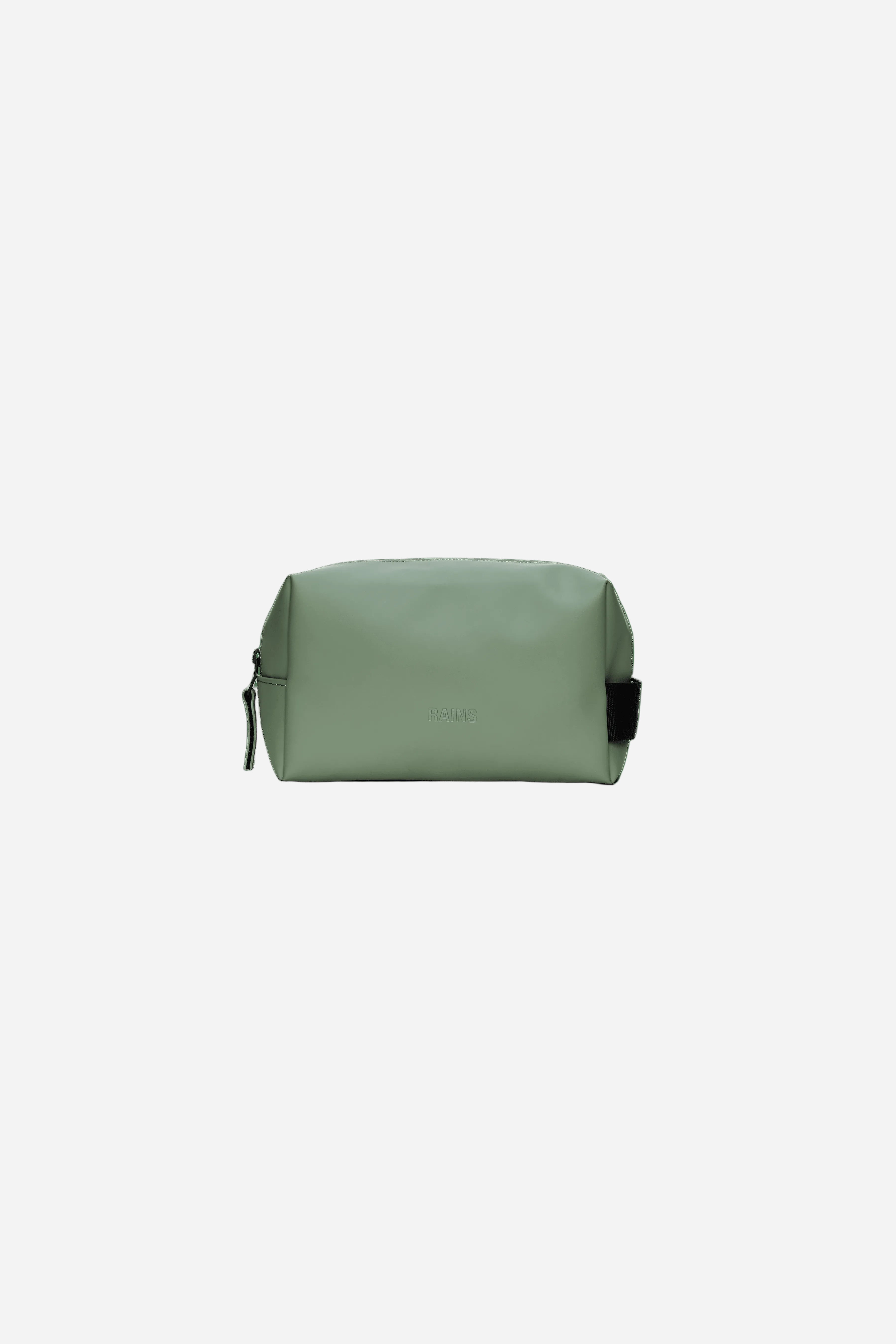 Light green toiletry bag with black accents on a green background