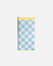 A rectangular metal tin with a light blue and white checkerboard pattern, featuring a pale yellow lid and bottom trim, set against a plain white background.