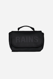 Black bag with 'RAINS' branding on a green background