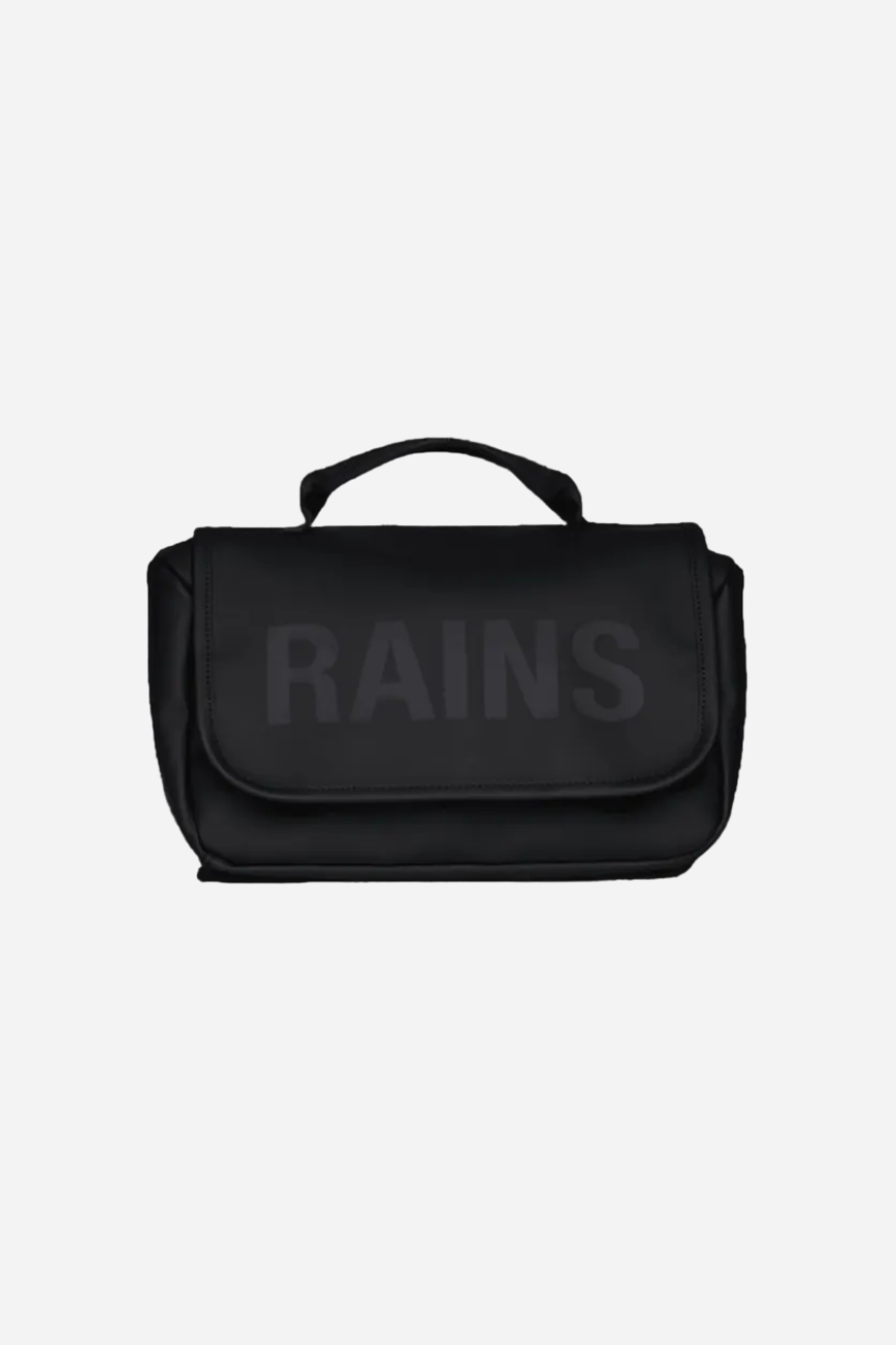 Black bag with 'RAINS' branding on a green background