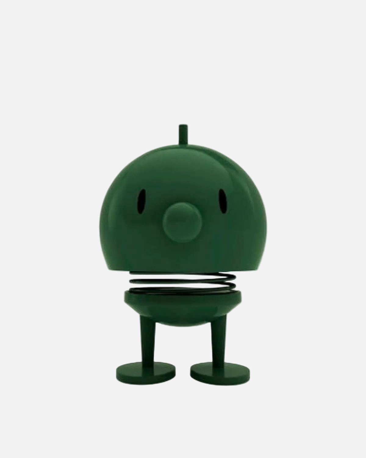 A dark green robot-shaped spring toy with a round head, small eye cutouts, a circular nose, a coiled spring between the head and legs, and two round feet, shown on a plain white background.