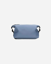 Blue bag with black straps on a white background
