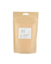 Beige packaging of cold and flu salts with a label on a white background