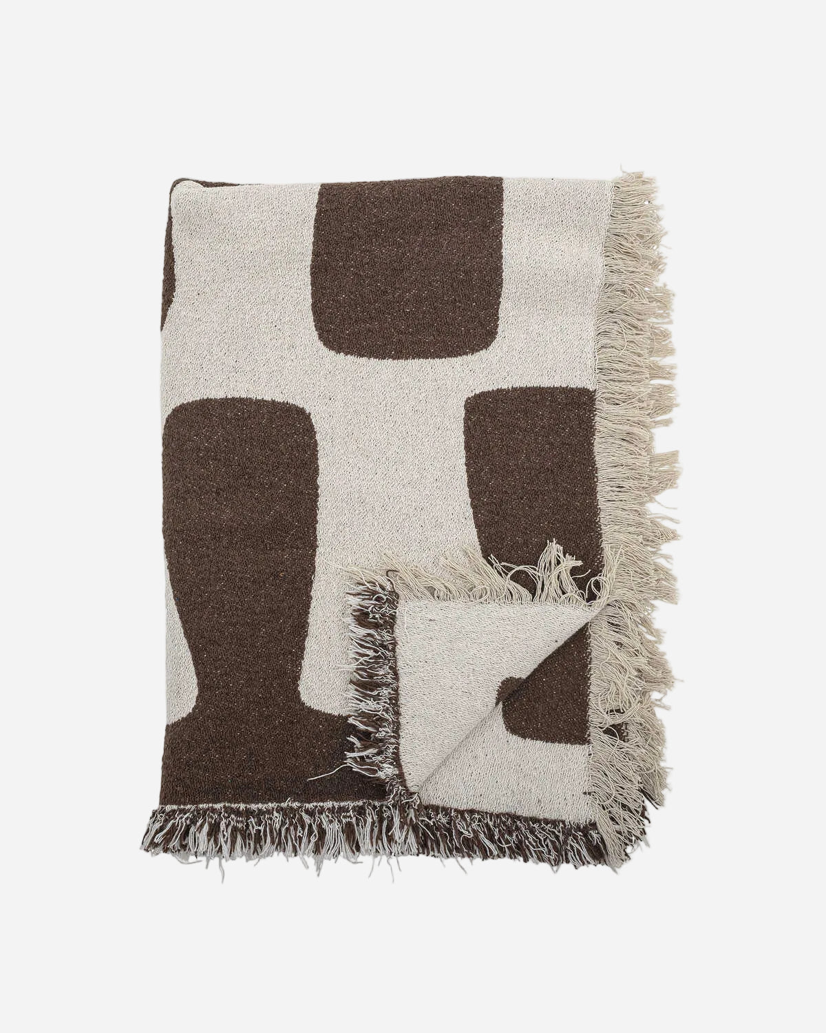 Brown and white patterned throw blanket with fringes on a white background