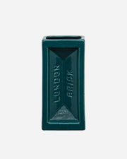 Teal rectangular container labeled 'London Brick' on a white background