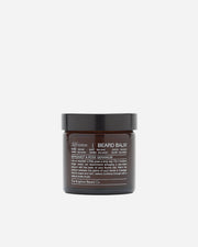 Beard balm jar with black lid and label on a white background