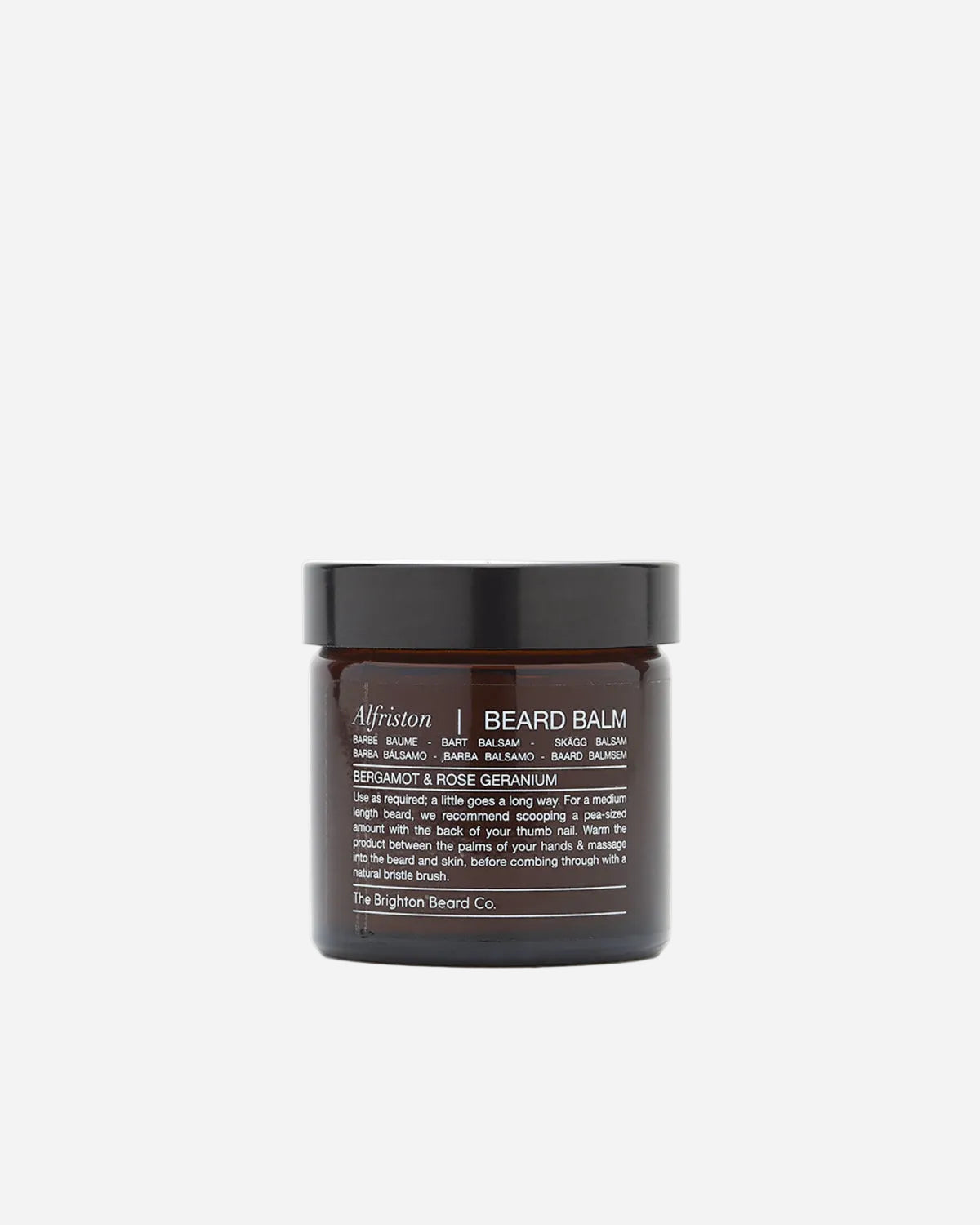 Beard balm jar with black lid and label on a white background