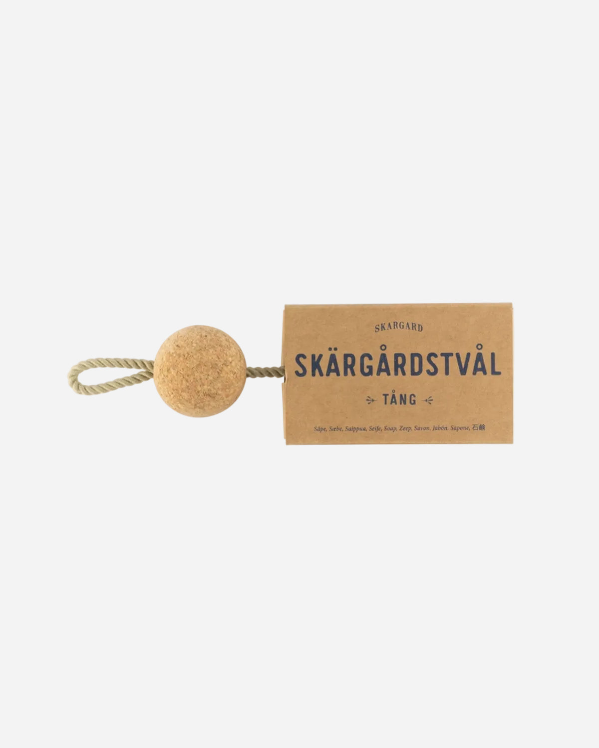 Cork ball with a rope and a cardboard tag labeled 'Skärgärdstvål' on a white background