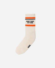 WHITE sock with text DON'T KALE MY VIBE on a white background