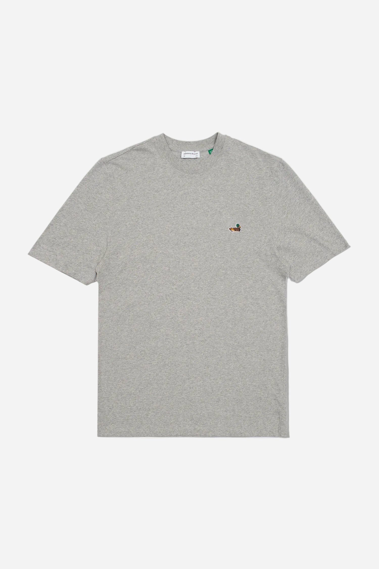 Gray t-shirt with a small logo on a white background