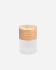 White lamp with a wooden base on a white background