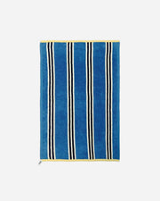 Blue towel with black and white stripes on a white background