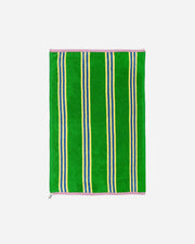 Green towel with blue and yellow stripes on a white background