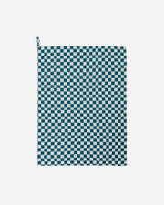 Teal and white checkered towel on a white background