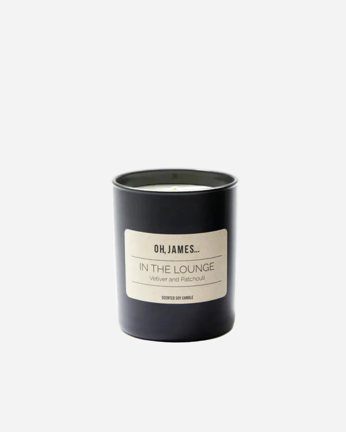 Black candle with a label on a white background