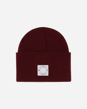 Maroon beanie with a white logo on a white background