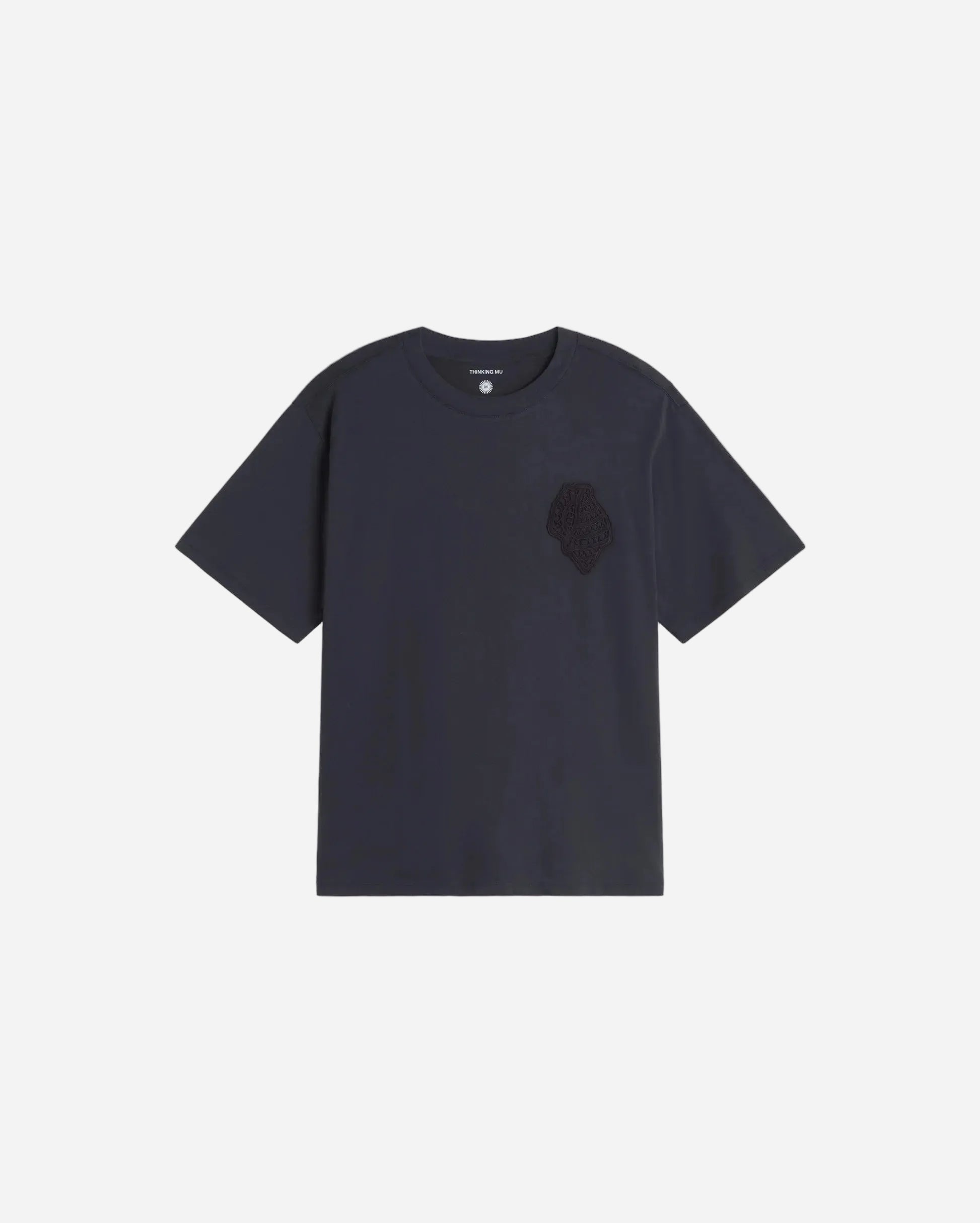 navy t-shirt with an embroidered shell patch on a white background