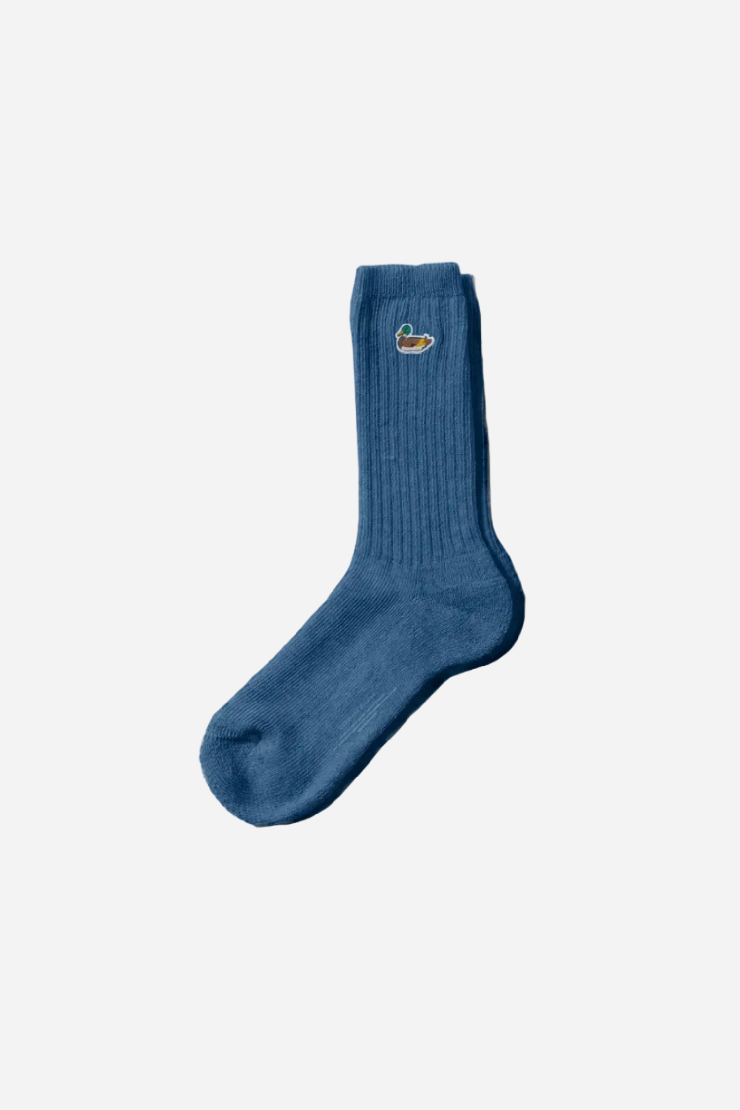 Blue sock with a logo on a light gray background