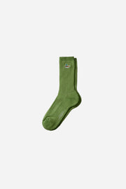 Green sock on a white background