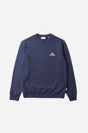 Navy blue sweatshirt with a logo on a light gray background