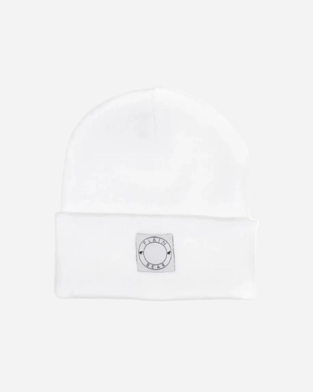 White beanie with a logo patch on a white background