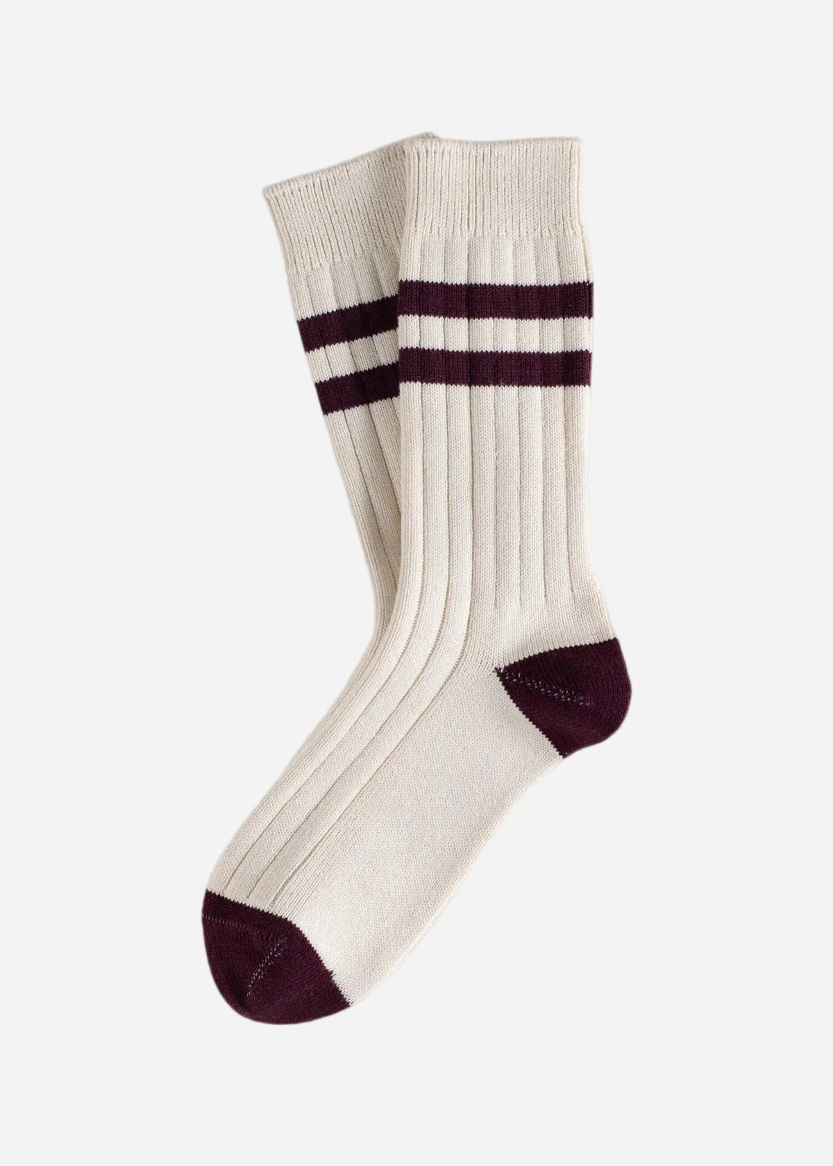 White sock with purple stripes and cuffs on a white background