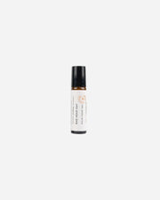 Small bottle of 'Bad Hair Day' hair oil on a white background