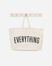 Beige tote bag with 'EVERYTHING' text on a white background