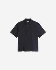 Navy short-sleeve shirt on a light gray background
