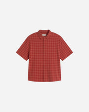 Red checkered shirt on a light beige background
