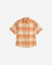 Plaid shirt with short sleeves on a light beige background