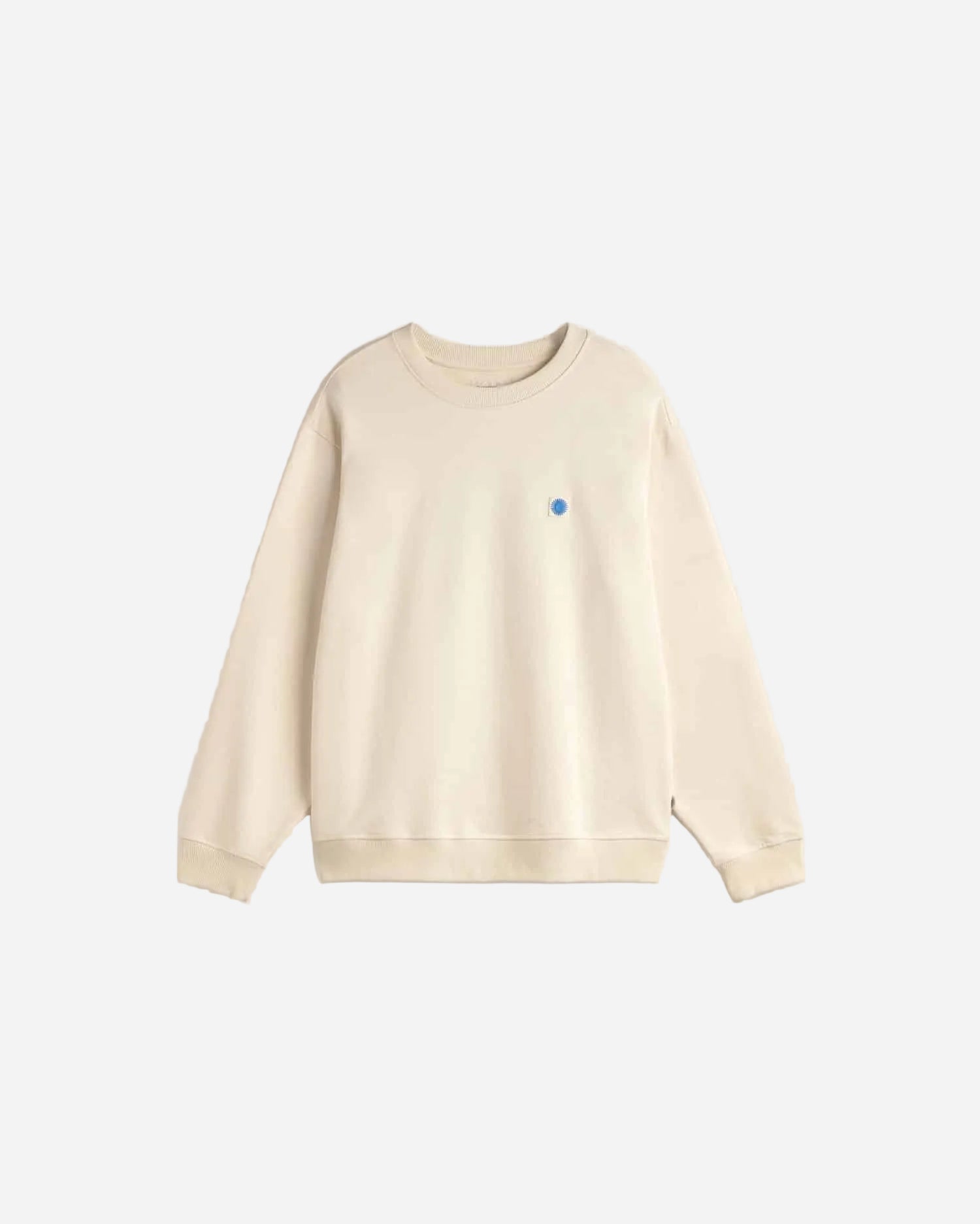 Beige sweatshirt with a small colorful logo on a light gray background