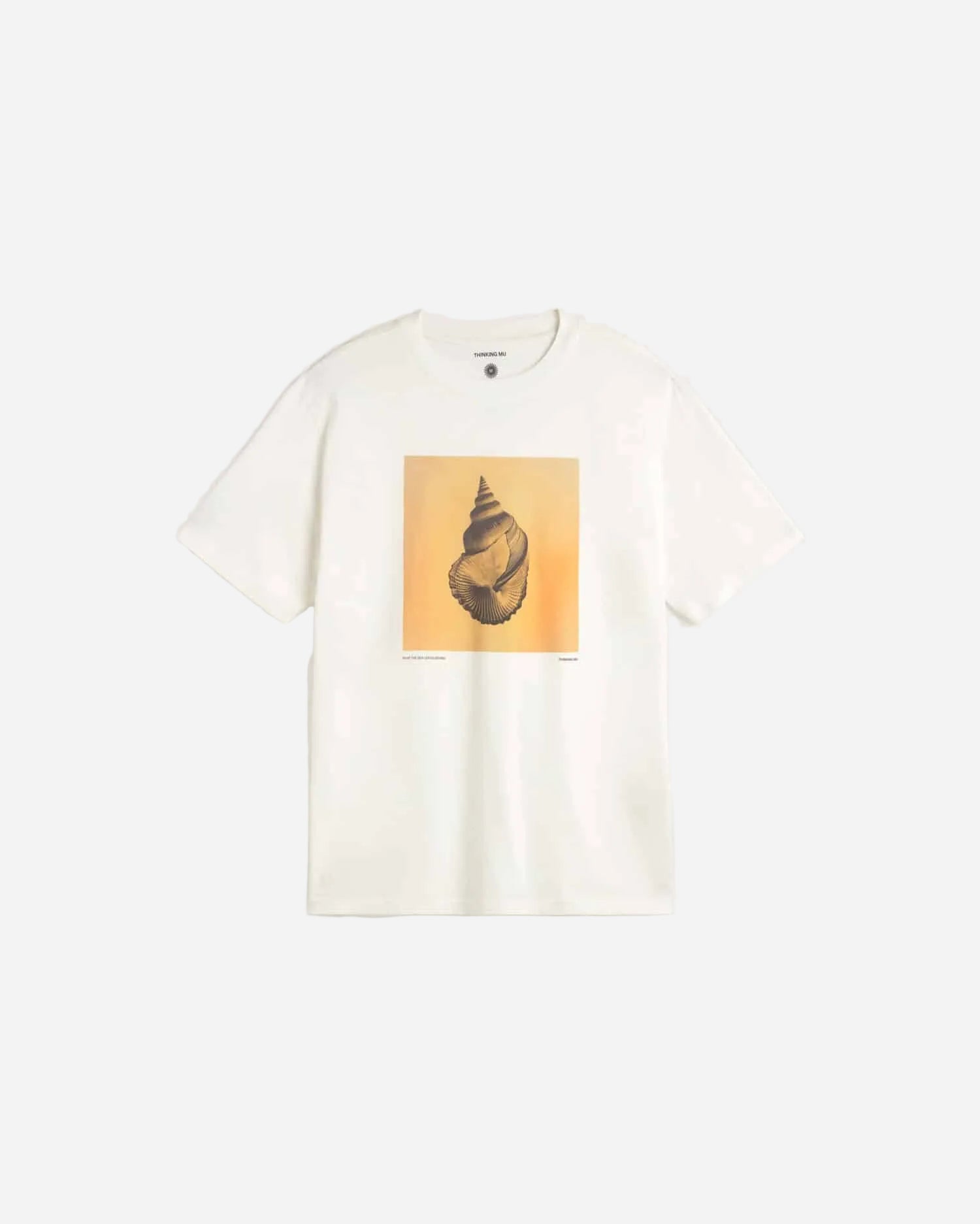 White t-shirt with a shell graphic on a light gray background